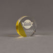 Angle view of ColorCast™ 4" Circle Acrylic Award with yellow transparent color highlight showing trophy laser engraving.