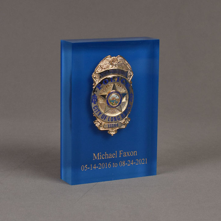 Angle view of 6" Lucite® Badge Embedment with police service badge cast inside clear acrylic.