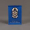 Front view of 6" Lucite® Badge Embedment with police service badge cast inside clear acrylic.