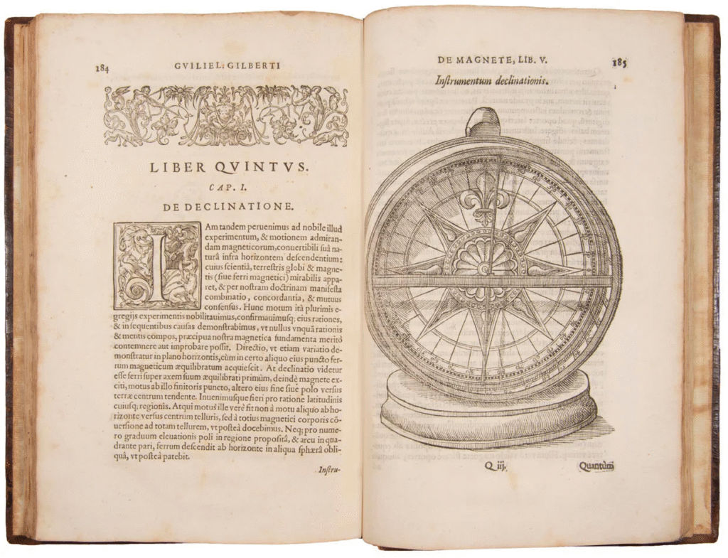 Historical book with compass illustration, Latin text.