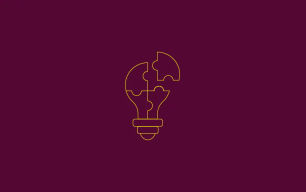 An icon depicting a light bulb separated into jigsaw shapes.