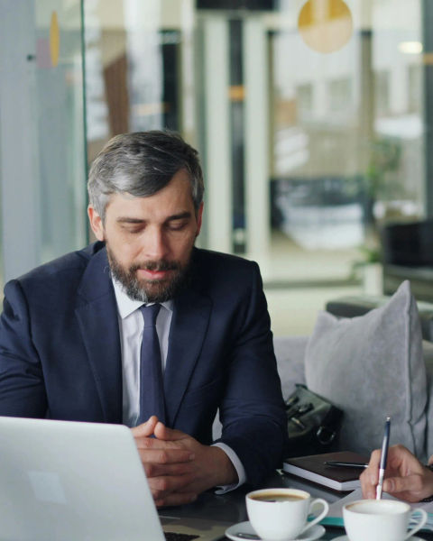 Two people meeting in an office environment.