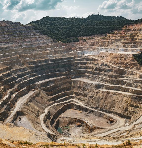 A wide shot of an open cut mine.