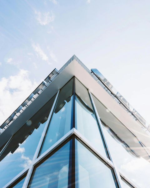 An upward shot of an office building.