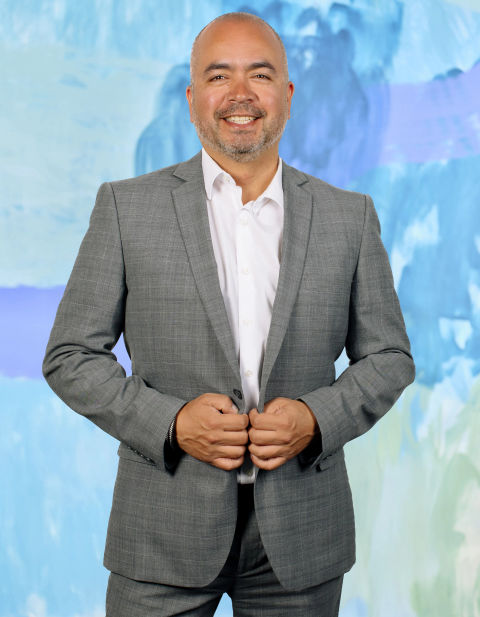 A profile shot of Luis Padilla.