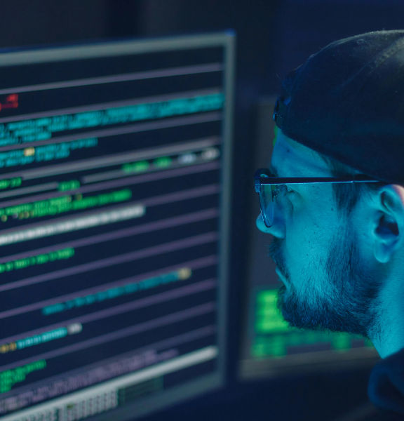 A man looking at a computer screen.