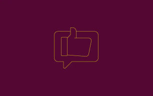 An icon depicting a thumbs up inside a speech bubble