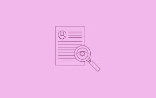 An icon depicting a magnifying glass over a document