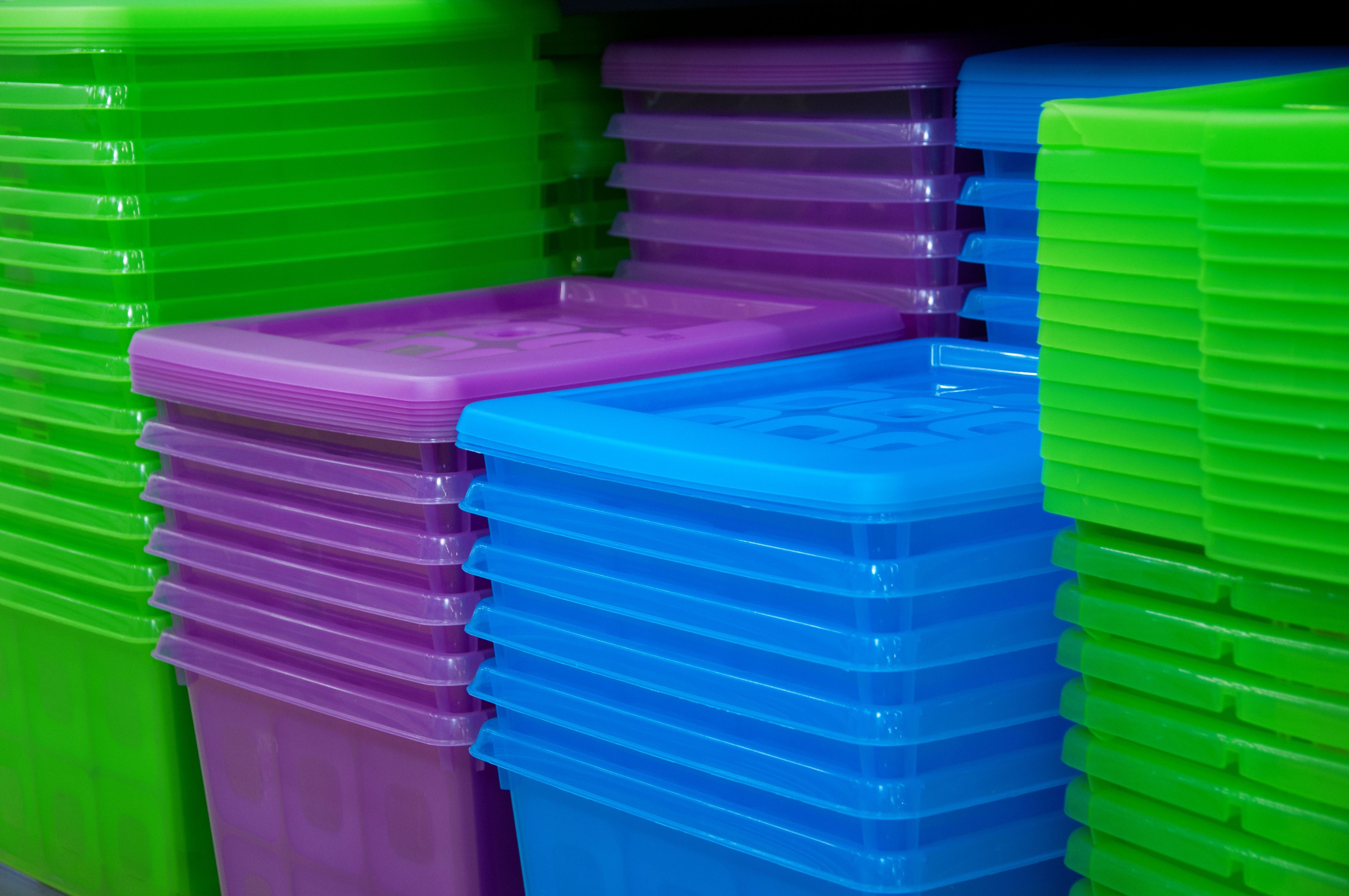 Storage tubs Colored plastic containers stacked