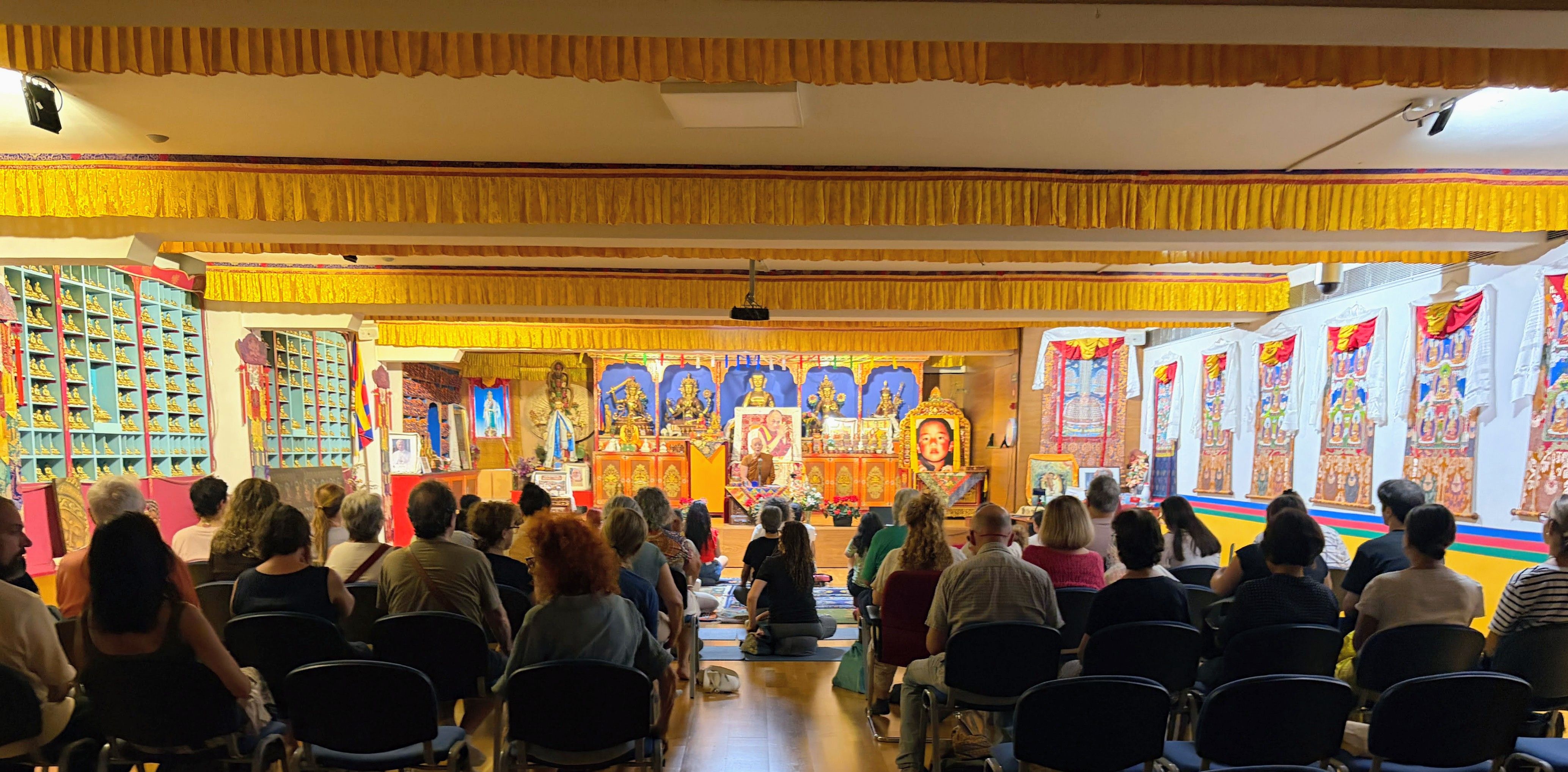 Ayya Arindama teaching in a Tibetan retreat center hall
