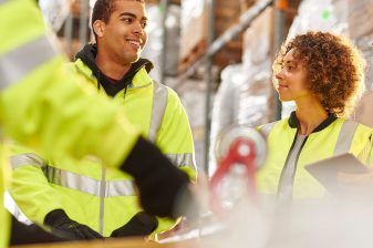 Happy warehouse workers