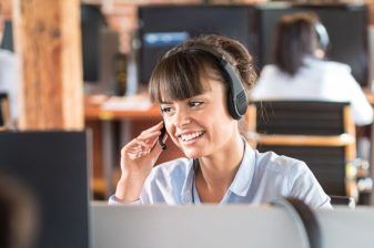 Anglo Pacific Customer Service Manager talking to customers on the phone.