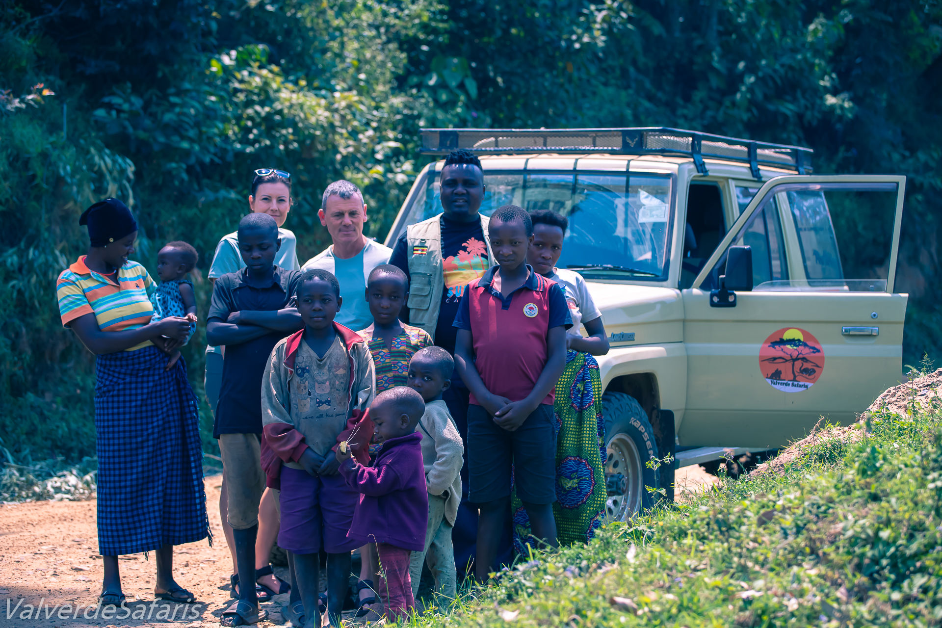 Travelers observing wildlife scenery during a private safari in Uganda