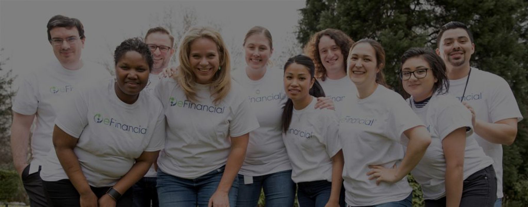 A group of people wearing eFinancial T-shirts