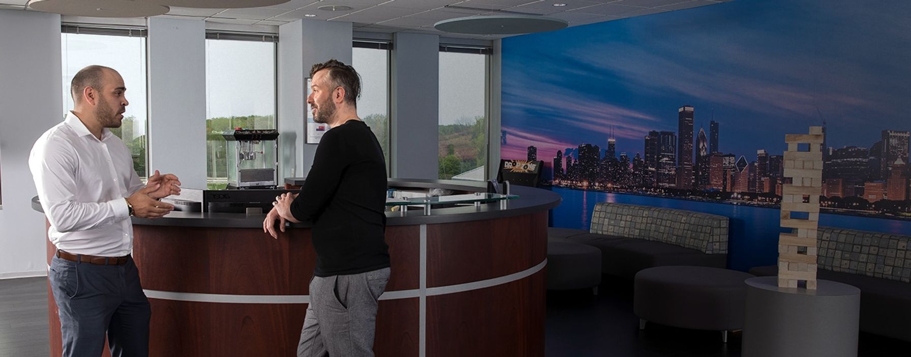 Two business men talking in a Chicago eFinancial office