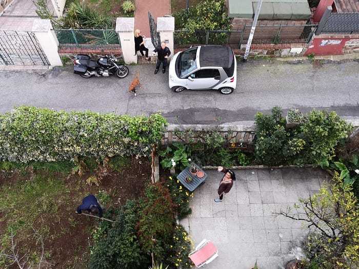 Social distancing photo gallery - people in Italy cooking and drinking aperitif outside from their gardens