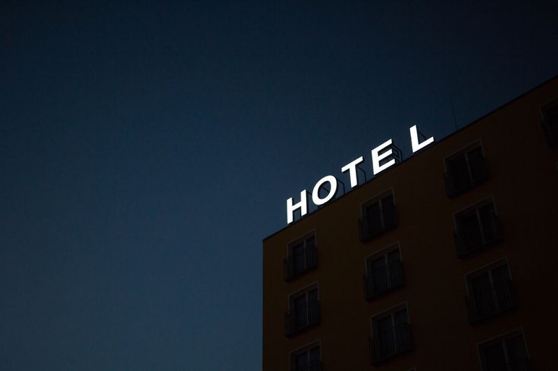 Coronavirus and Reopening - hotel sign at night
