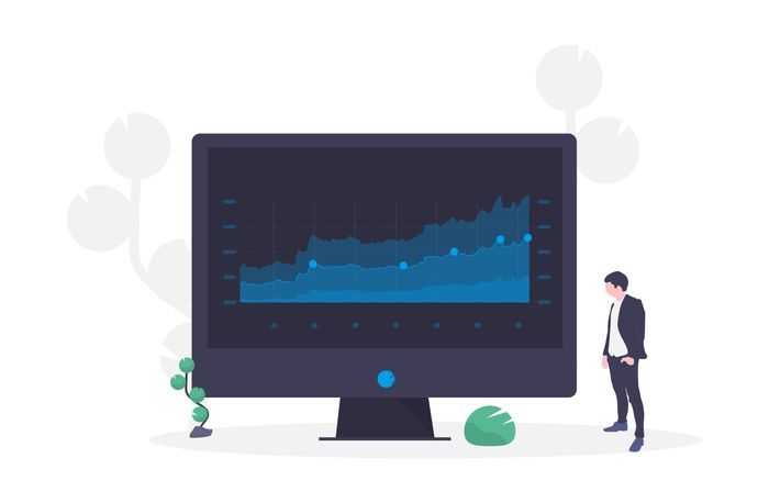 online marketing agency - man standing next to a giant black screen showing data in blue