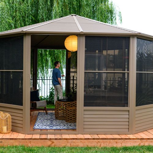 Stylish outdoor gazebo with screens, perfect for backyard relaxation and entertaining