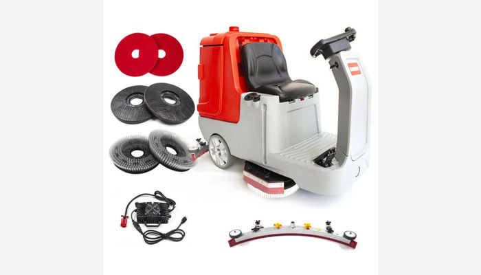 Compact floor scrubber machine with cleaning pads and accessories for efficient floor maintenance