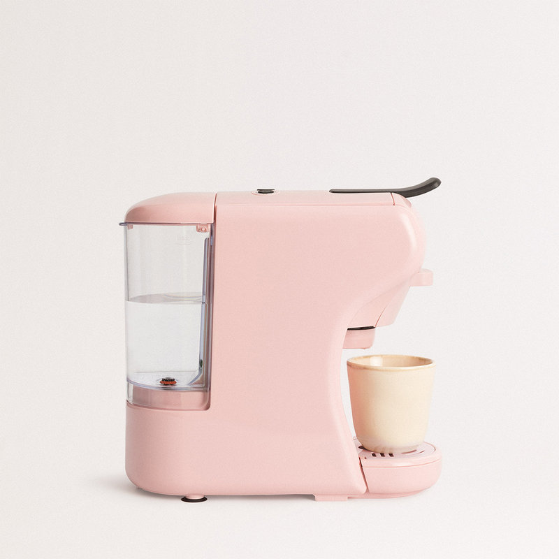 Pastel pink coffee machine on Craiyon