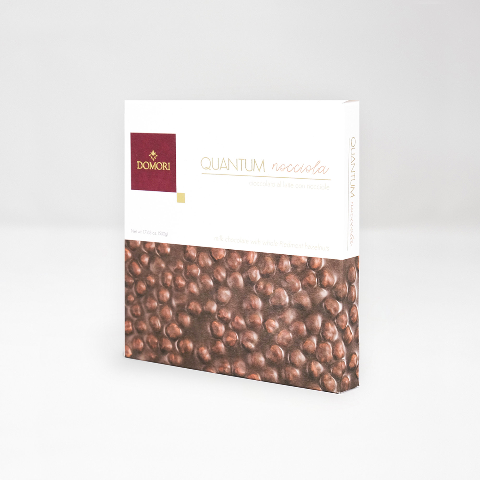 Chocolate con leche cuántica y avellanas enteras 500 gr Domori vista1