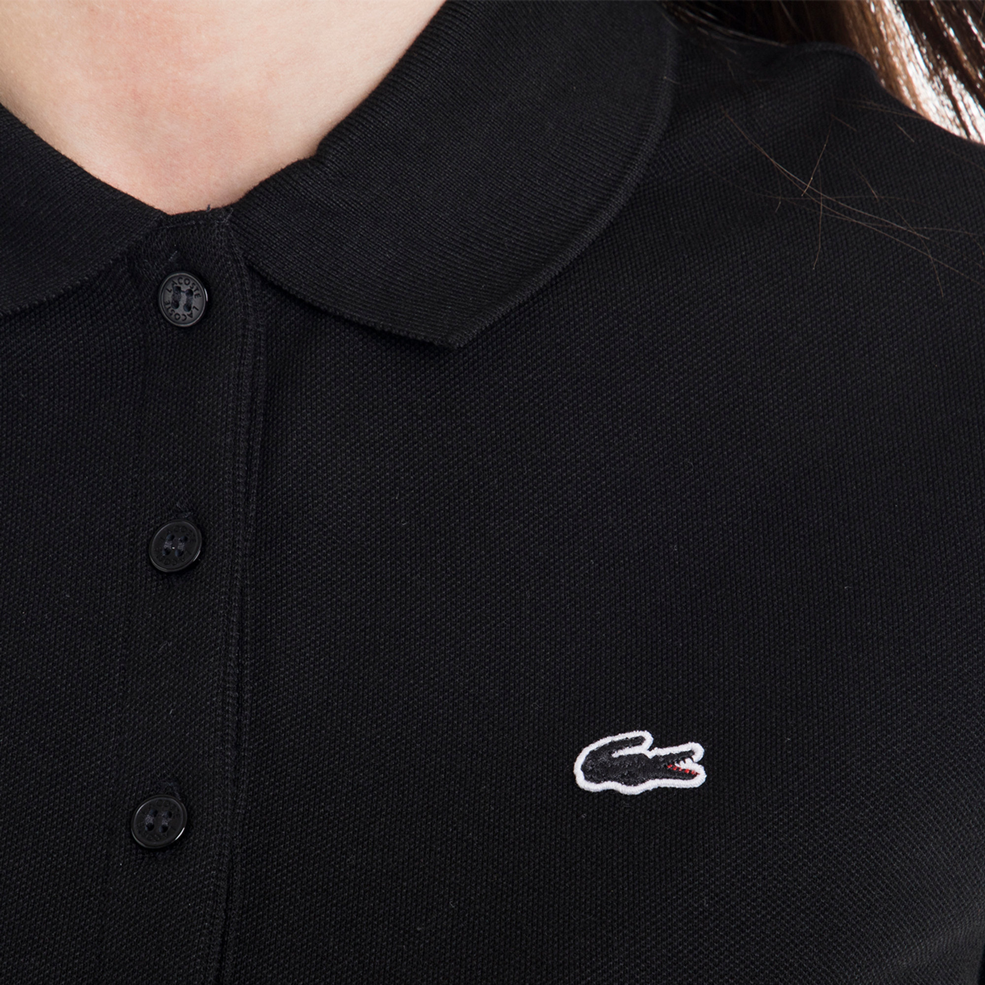 Polo slim con maniche corte nera Lacoste vista1