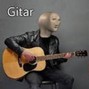 Maksos - bald guy plaing guitar