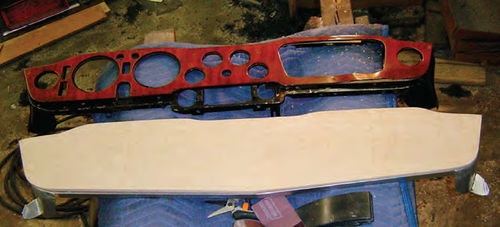 Photo 23. A solid board of quilted maple was used to replace the former face of the dash.