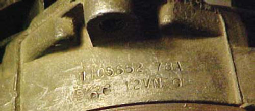 Photo 4. The stamping located behind the alternator’s adjustment ear indicates model number, amp rating, and that it’s 12-volt negative.