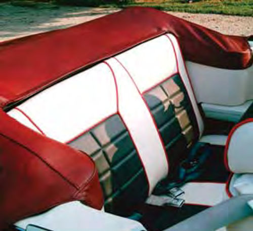 The Mustang convertible’s aging red and white upholstery was replaced with new coverings in red, white and charcoal.