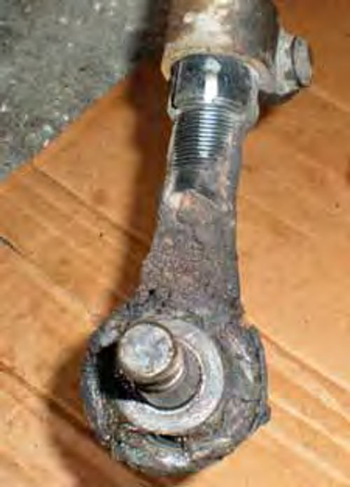 Photo 9. Mark your tie rod end and sleeve so you can keep track of the number of turns required to remove it.