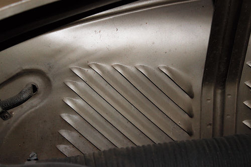 Photo 18. Inner Fender Panel Louvers: This ’41 Lincoln is equipped with under hood louvers on the inner fender well panels. I recommend this modification to reduce underhood temperatures.