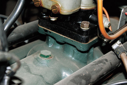 Photo 20. Carburetor Heat Insulation: If the carb gets hot and the gas is boilin’ (over 100°), install an insulating gasket at least 1/4-inch thick.