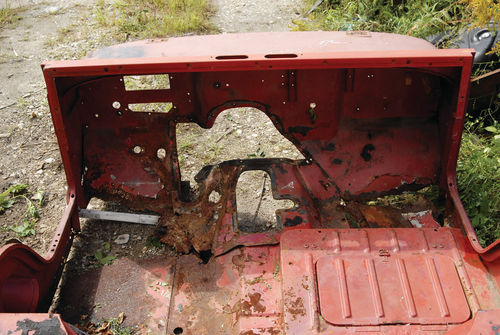 Damage from years of plowing snow and working in road salt is obvious on the original body tub. Earlier repairs just weren’t enough to save it, and the rust and holes are representative of what might be found on a restoration candidate.