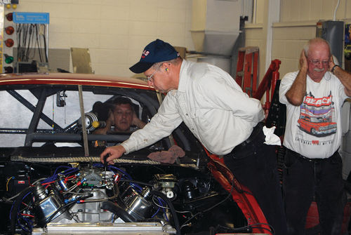 Earplugs allowed Sarna to keep tuning the engine while other crew members covered their ears as the powerful V-8 kicked to life in this small one-room shop at Fox Valley Tech.