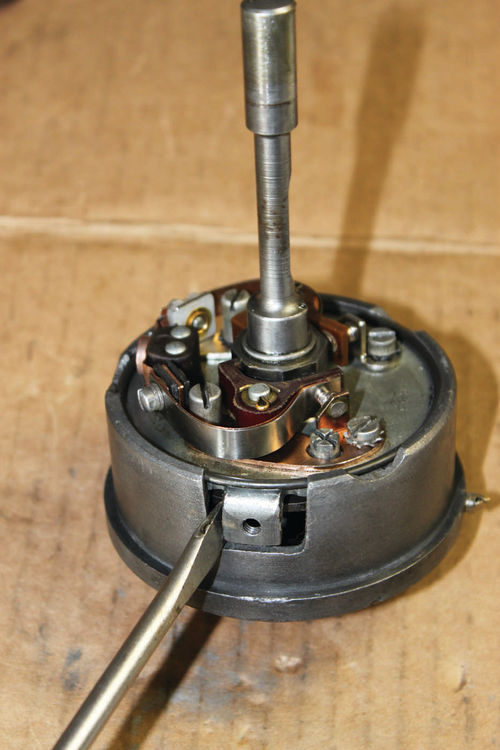 Photo 13. Distributor Circuit Breaker Plate Snap Ring: Rotate the point plate with a screwdriver to ensure moderate effort to rotate plate with no binding.