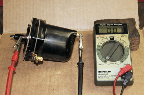 Photo 14 (left). Coil Primary Resistance: Connect a digital ohmmeter to the primary input terminal and the spring contact (to the point plate).