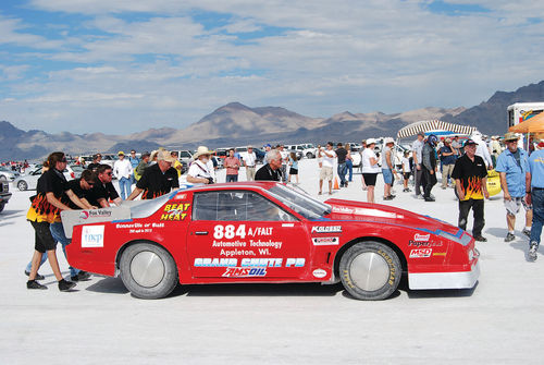 There was a group effort involved when it came time to push the car toward the starting line. The hot rod-flamed team shirts were a new addition for this trip.