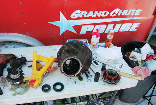 Once there, the Firebird’s axle was torn down quickly and the parts were placed on a table along with tools and equipment.