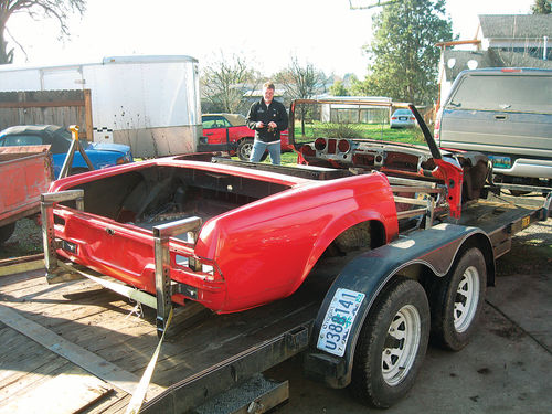 Here is the old girl being placed on Troy’s trailer with additional metal skids underneath.