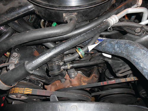 Photo 3. Vacuum hoses and wiring must be identified and cleared away before getting started.