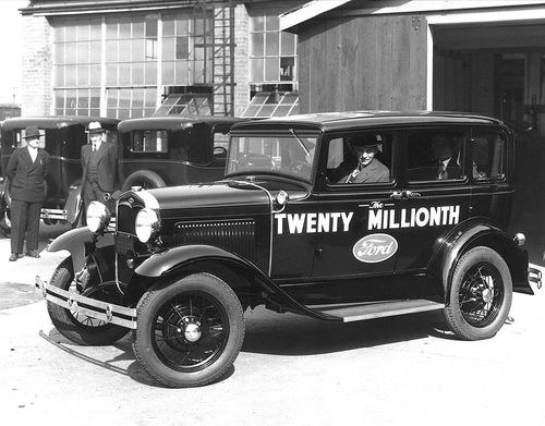 Henry Ford with another of his famous automobiles. This time, it’s a Model A.