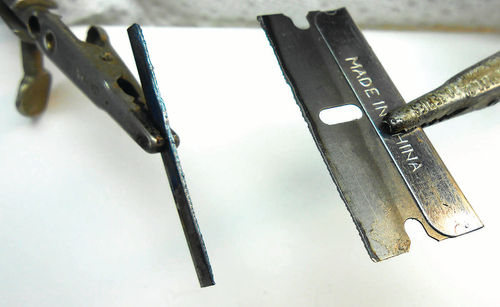 Photo 15. The Powermax30 even trimmed the edge off this razor blade without heat distortion.