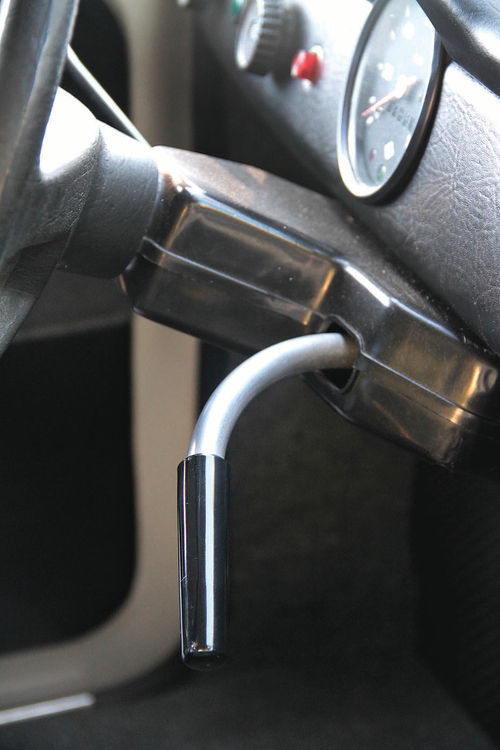 The transmission is an H-gate fourspeed. The shift lever goes in and out, up and down.