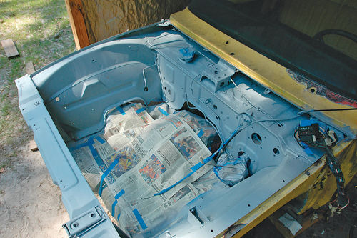 The engine compartment in primer.