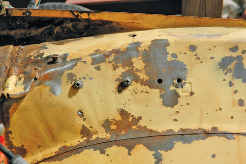 Here’s the engine bay after a lot of wire-brushing, fine sandpaper work and repeated washing.