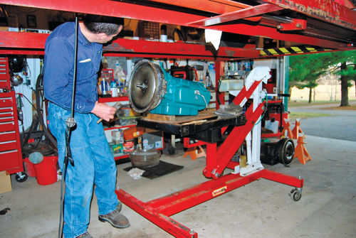 18. A $400 used transaxle lift eased the job of lifting the heavy automatic into the car.