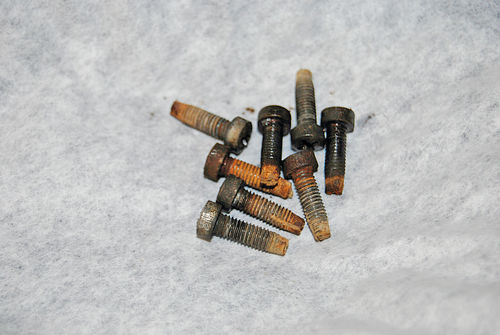 9. The corrosion on the fine-thread bolts to the right shows why they get hung up and are hard to remove.