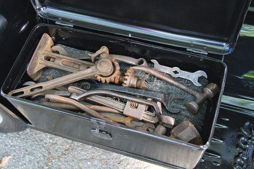 This running board toolbox is full of original Ford tools.